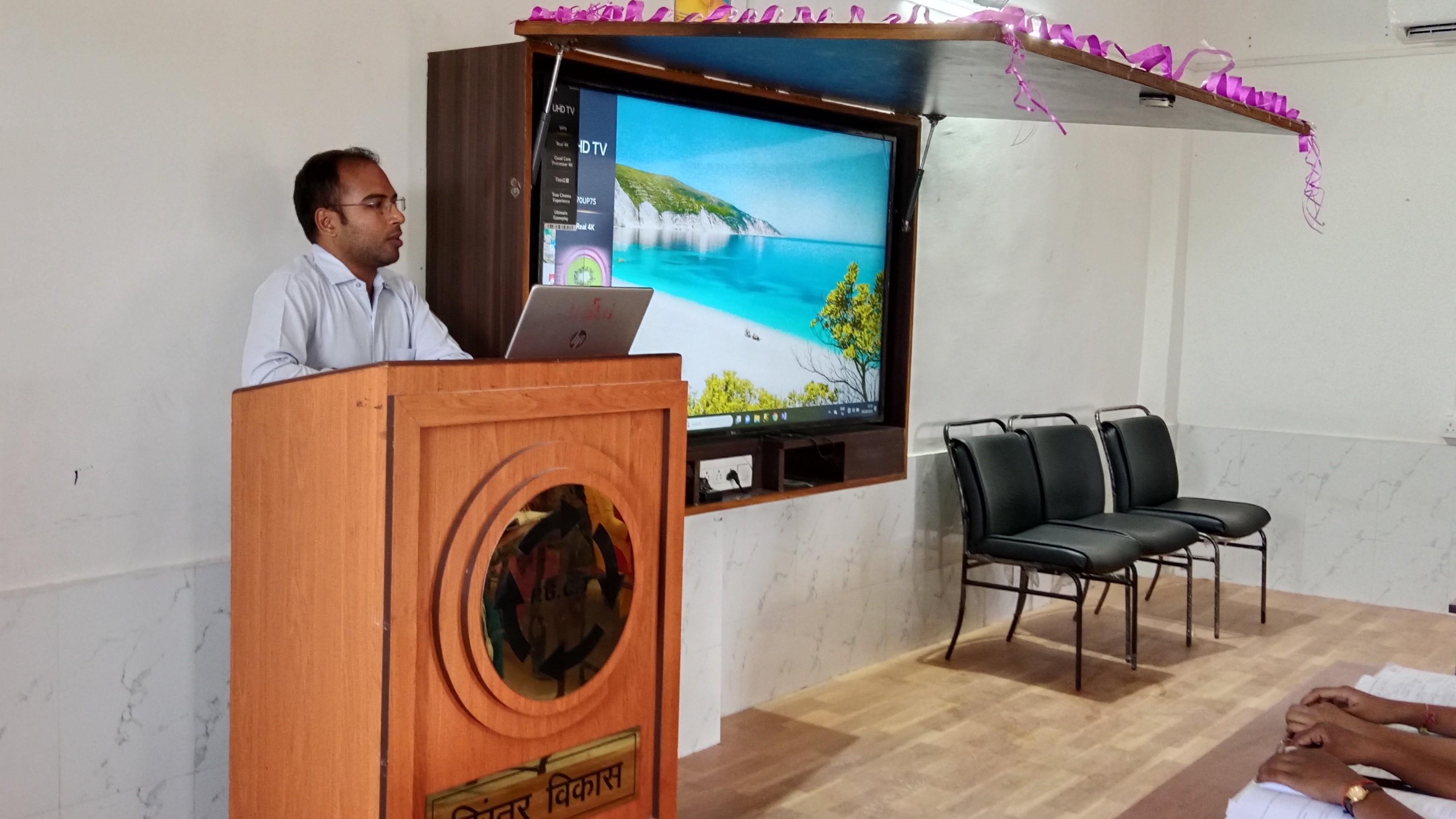 Teacher teaching in smart class